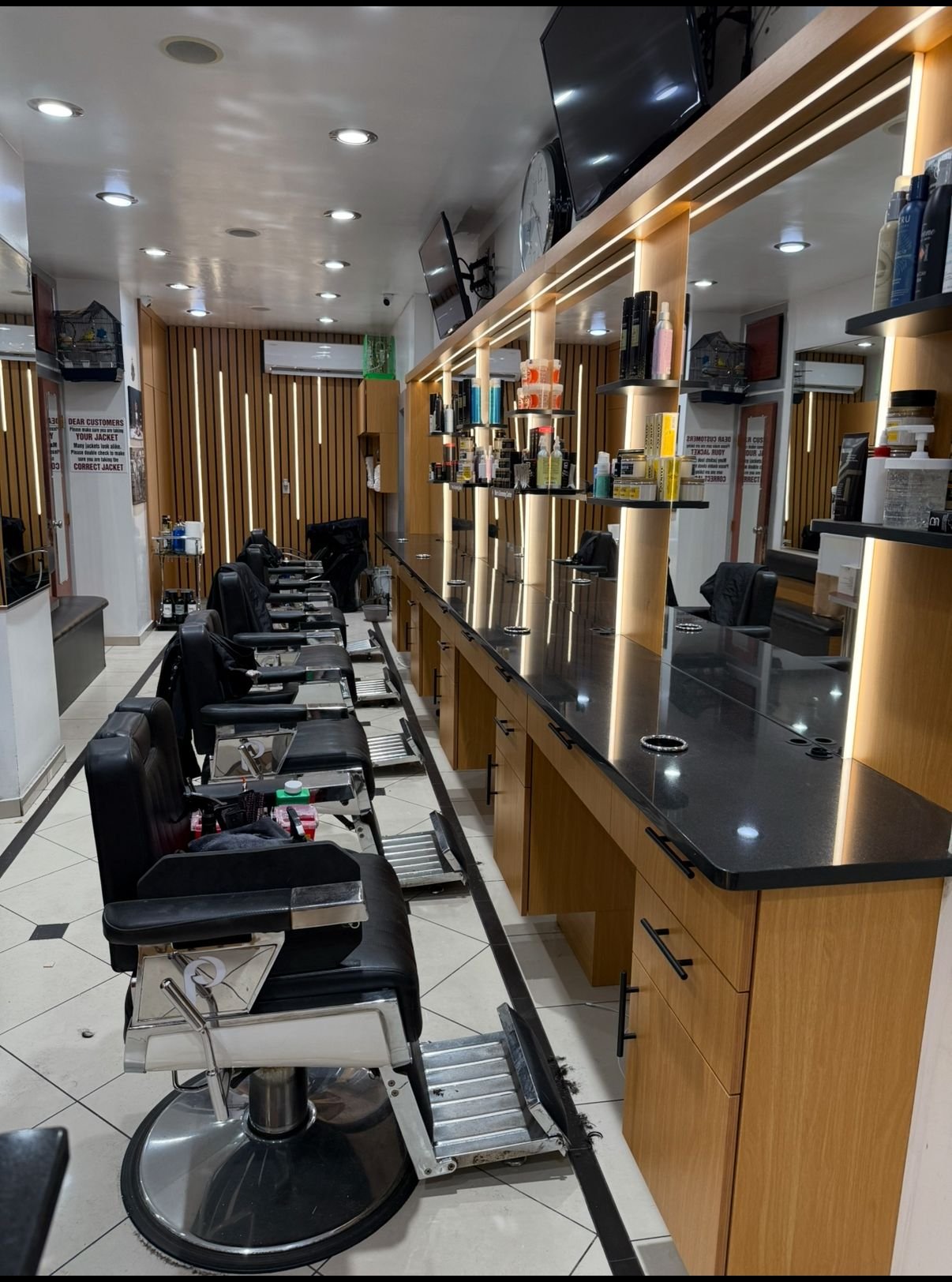 Barbershop 72 interior with chairs, mirrors and organized grooming stations